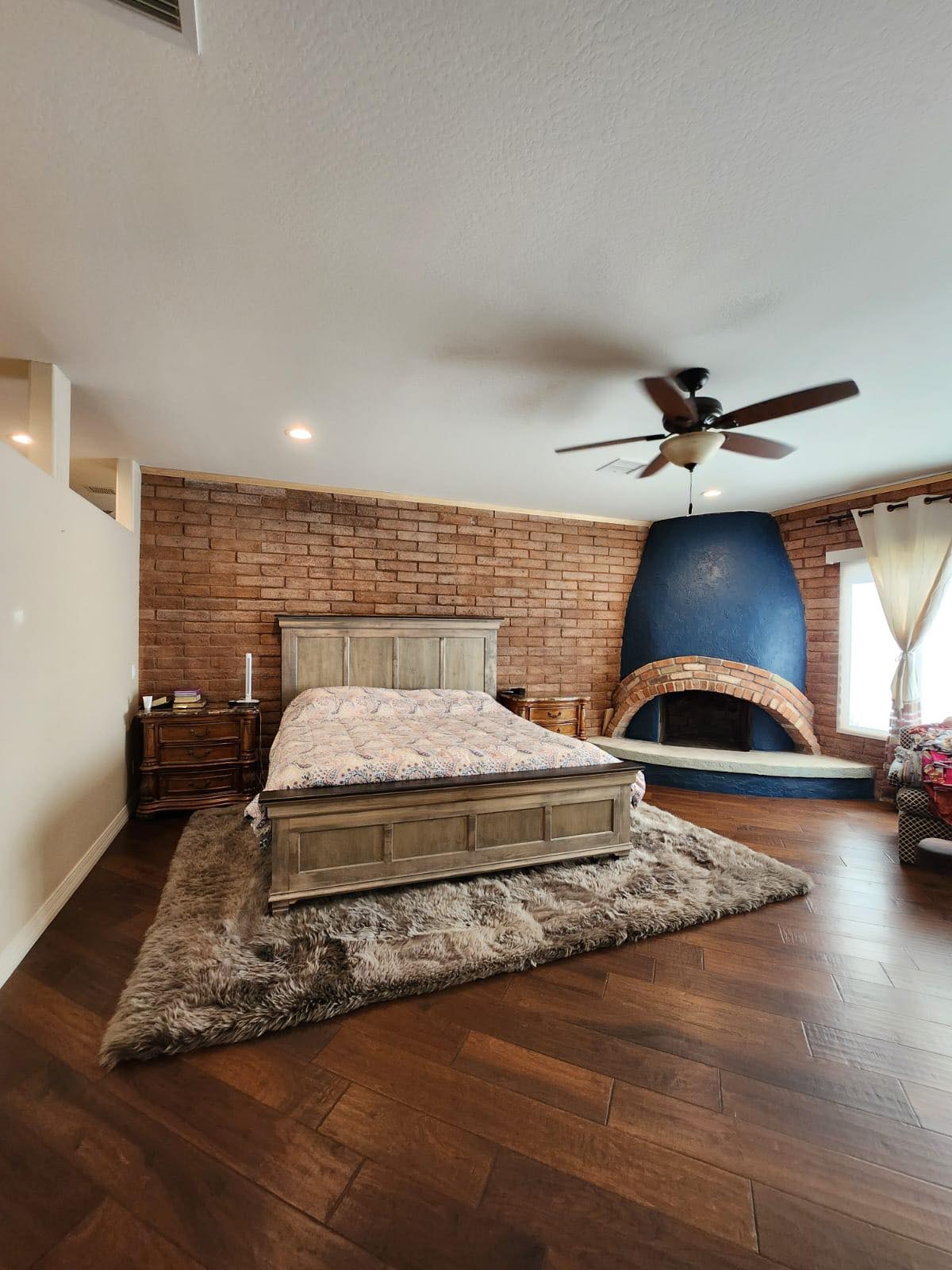 Cozy living room with fireplace — cleaned by Swan Cleaning Services